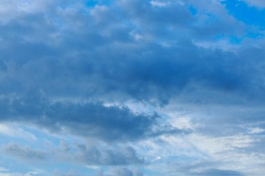 daylight blue sky with white fluffy clouds
