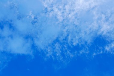heaven blue sky with white fluffy clouds