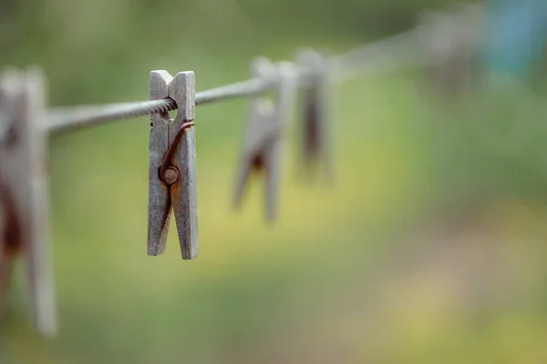 Wooden Clothespins Rope Outdoors Blurred Background — Foto de Stock