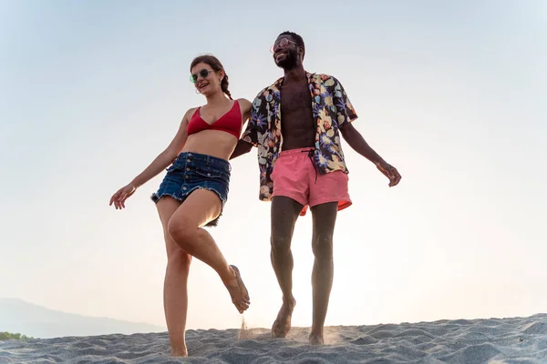 Engaged Biracial Couple Happily Walking Barefoot Sand Holding Together Multi — Stockfoto