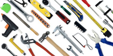 Topview of Different Work Tools on White Background- Stock Photo