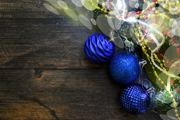 Christmas Background Dark Wood Fir Branches Garland Gifts Blue Balls — Foto Stock