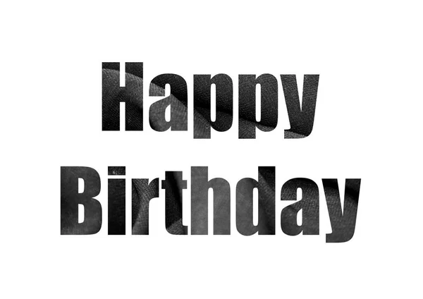 Black material textile. Shot through the cut-out silhouette of the word BIRTHDAY — Stock Photo, Image
