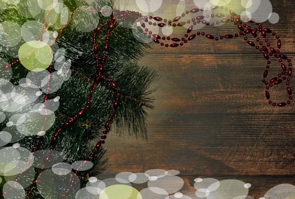 Christmas Background Dark Wood Fir Branches Red Beads Copy Space — Stock Photo, Image