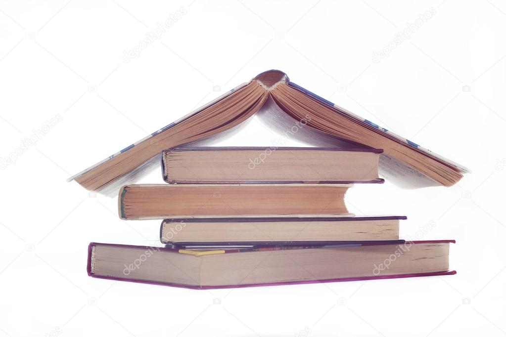 stack of books and open