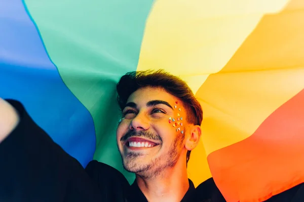 Joyful Bearded Homosexual Man Colorful Rhinestones Face Looking Smile Rainbow — Foto de Stock