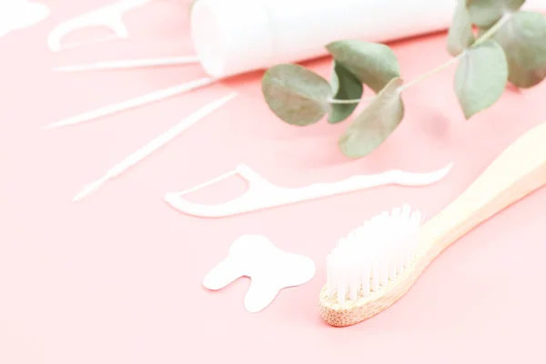 Bamboo Toothbrush Dental Floss Toothpicks Tube Toothpaste Soft Pink Background — Stock Photo, Image