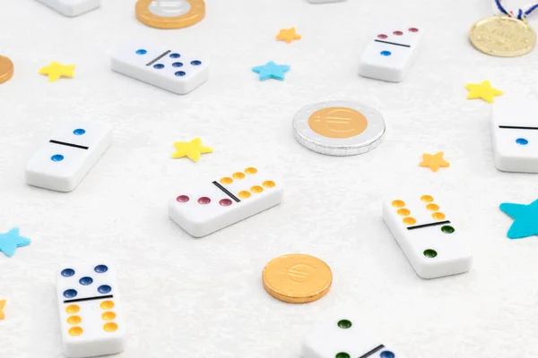 White Dominoes Colorful Dots Winner Medal Chocolate Coins Lie White — 图库照片
