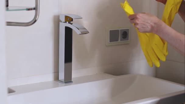 Hands Caucasian Young Woman Dress Yellow Gloves Washbasin Tap Bathroom — Vídeo de Stock