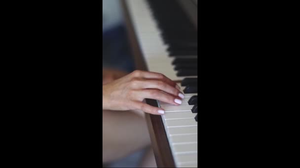 Hand Young Caucasian Woman Delicate White Manicure Fingering Keys Playing — Stockvideo