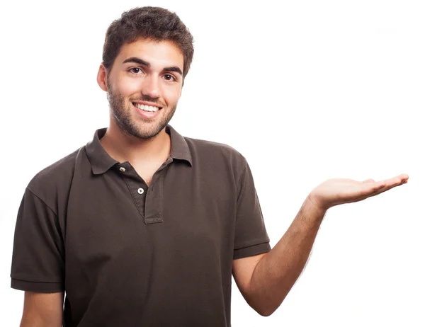 Young man showing something — Stock Photo, Image