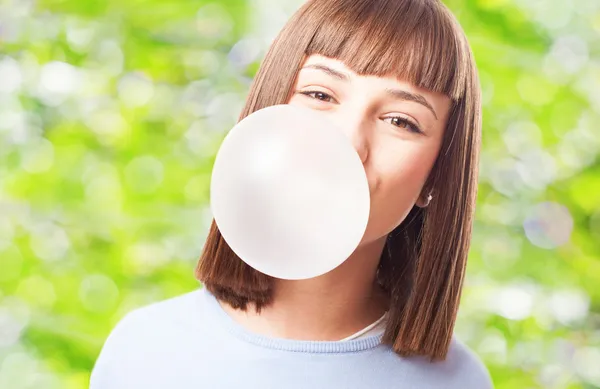 Girl doing with chewing gum — Stock Photo, Image