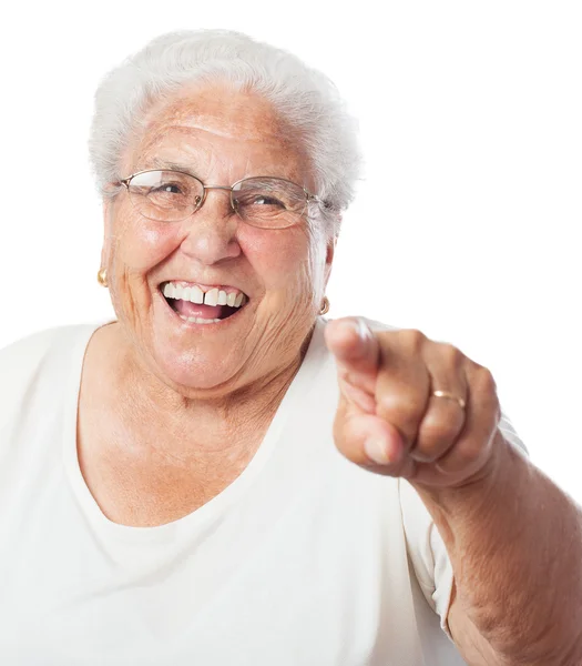 Elder woman pointing with finger — Stock Photo, Image