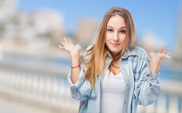 Woman doing indecision gesture — Stock Photo, Image