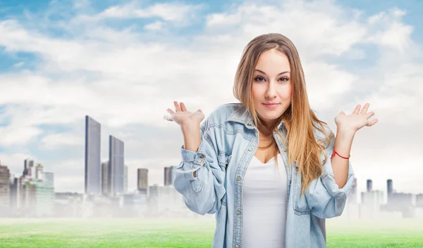 Woman doing indecision gesture — Stock Photo, Image