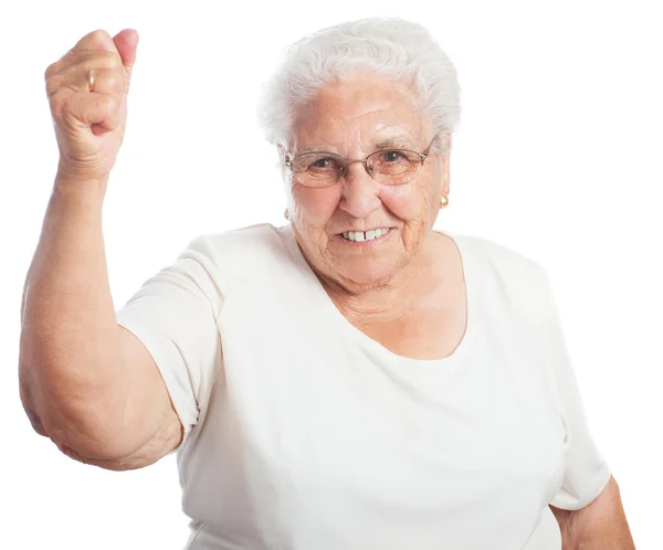 Mulher fazendo gesto vencedor — Fotografia de Stock