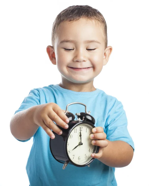 Kid holding alarm clock — Stock Photo, Image