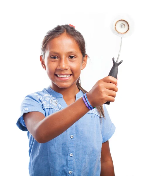 Girl holding paint roller — Stock Photo, Image