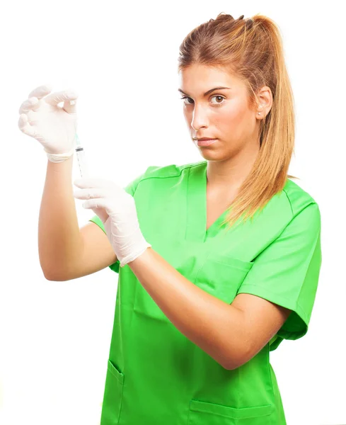 Nurse preparing needle — Stock Photo, Image