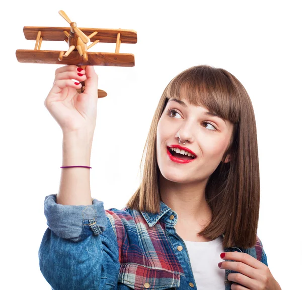 Mulher brincando com avião — Fotografia de Stock