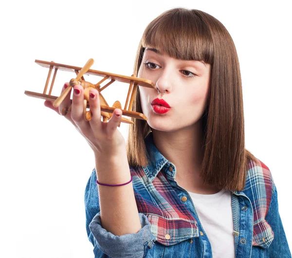 Vrouw spelen met vliegtuig — Stockfoto