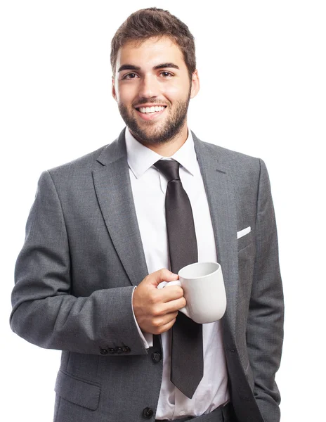 Business man holding tea mug — Stock Photo, Image