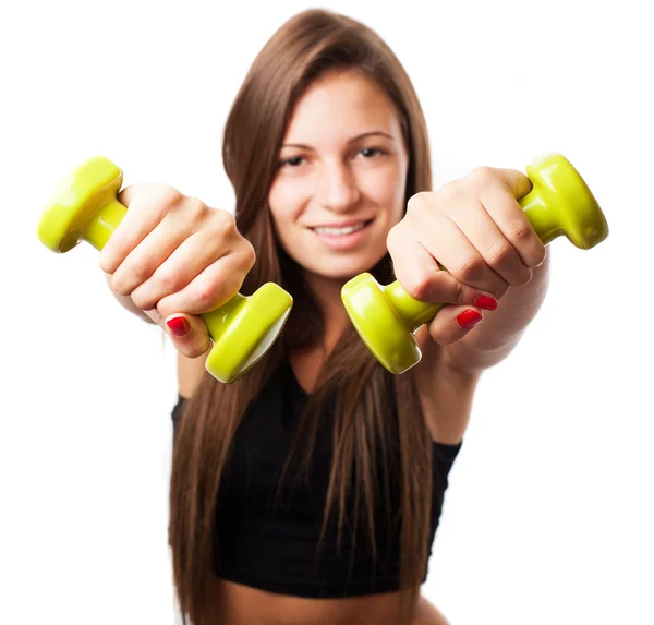 Teenager with dumbbells — Stock Photo, Image