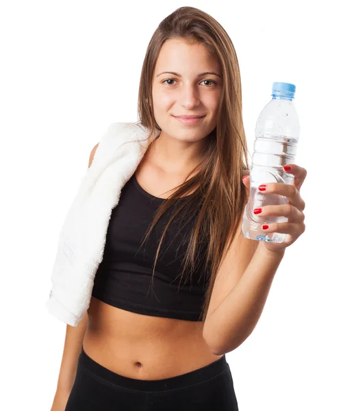 Woman holding water and towel — Stock Photo, Image