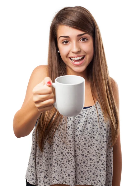 Woman offering mug — Stock Photo, Image