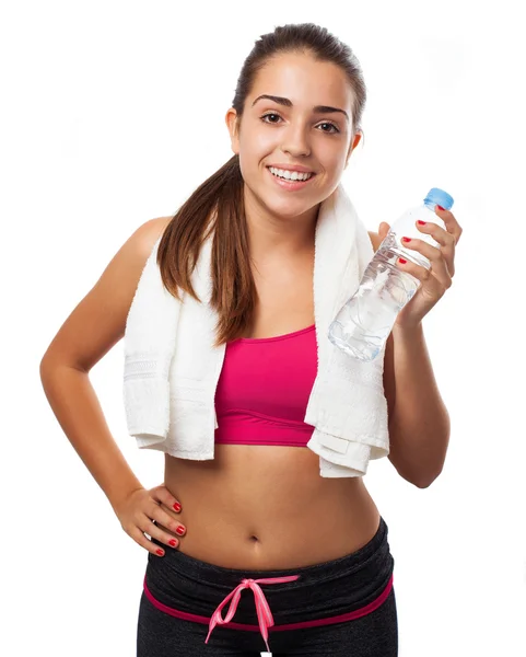 Sportieve vrouw bedrijf fles — Stockfoto