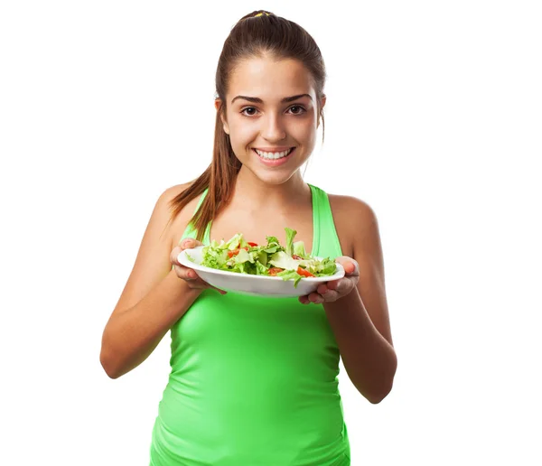 Vrouw bedrijf verse salade — Stockfoto