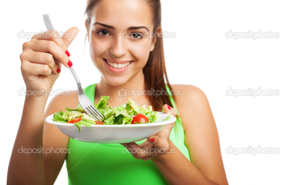 Woman holding fresh salad