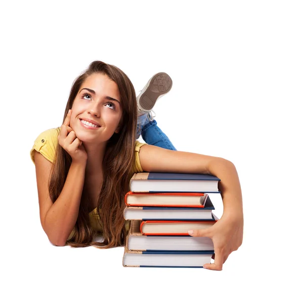 Woman hugging books — Stock Photo, Image