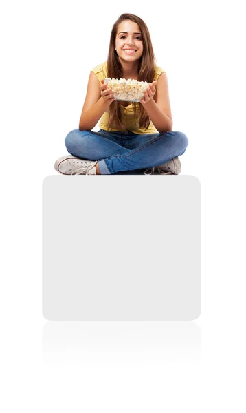 Woman holding pop corn bowl — Stock Photo, Image