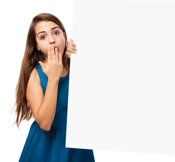 Surprised woman holding board — Stock Photo, Image
