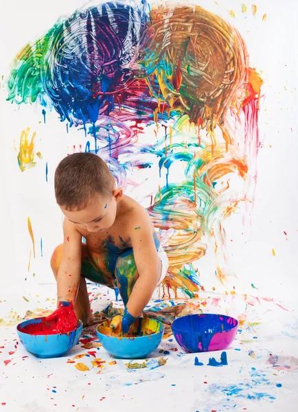 Adorable kid paints — Stock Photo, Image