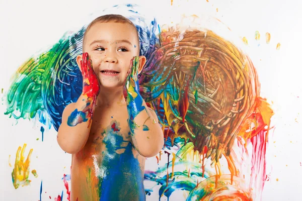 Adorable kid paints — Stock Photo, Image