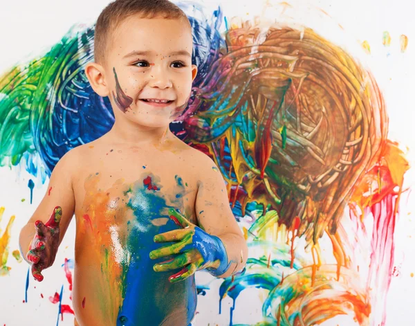 Adorable kid paints — Stock Photo, Image