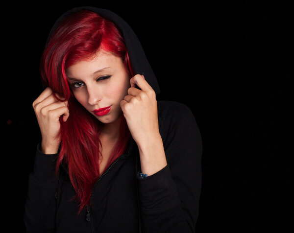 Woman covering her head with hood