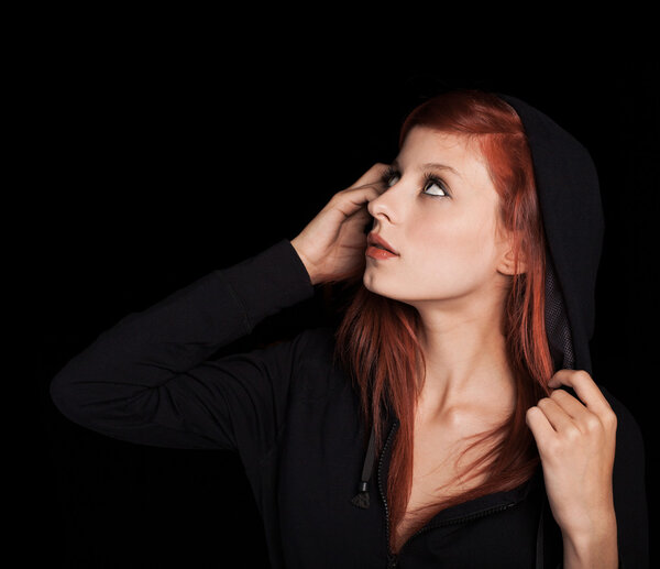 Woman covering her head with hood