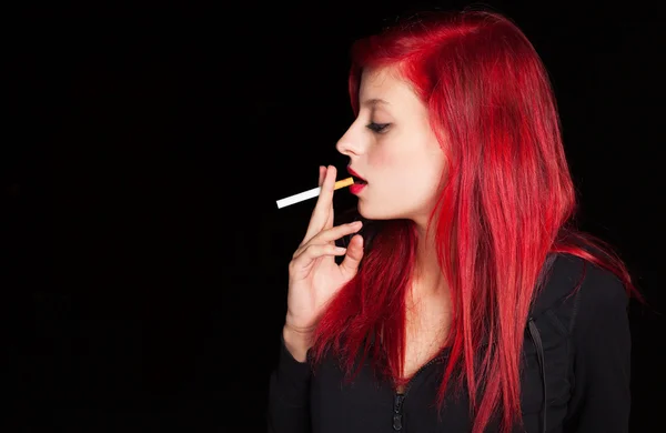 Woman smoking cigarette — Stock Photo, Image