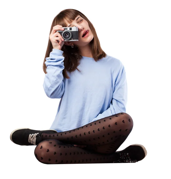 Ung flicka med foto — Stockfoto
