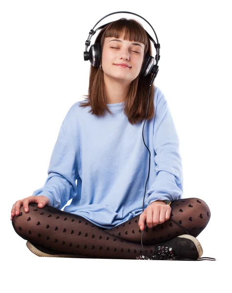 Junges Mädchen hört Musik — Stockfoto