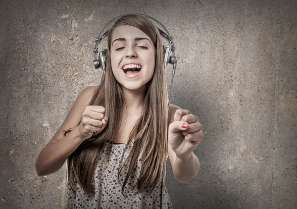 Young woman with headphones — Stock Photo, Image