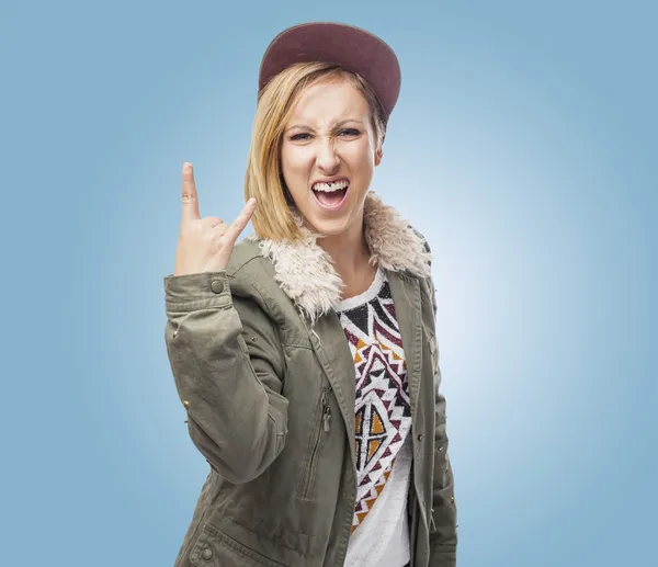 Woman doing horn sign — Stock Photo, Image