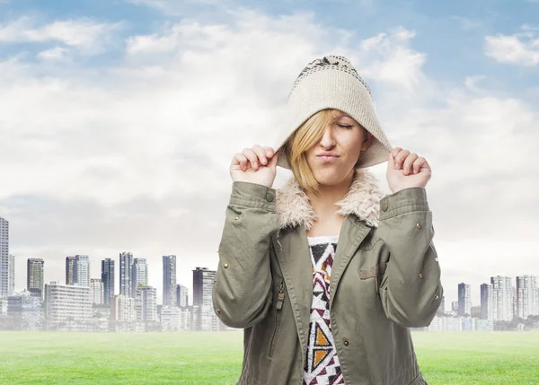 Angry girl in cap — Stock Photo, Image