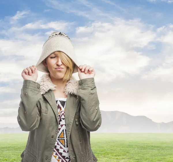 Angry girl in cap — Stock Photo, Image