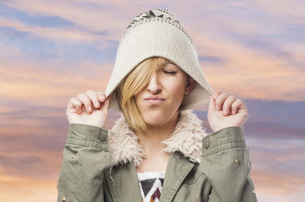 Angry girl in cap — Stock Photo, Image