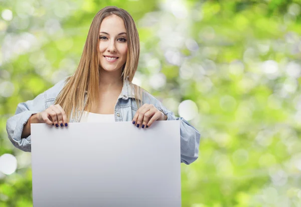 Woman holding white banner — Stock Photo, Image