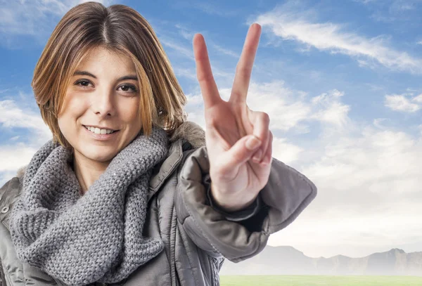 Woman making victory symbol — Stock Photo, Image